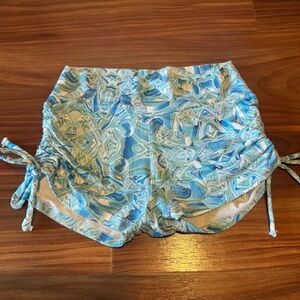 Yoganastix drawstring side yoga shorts.